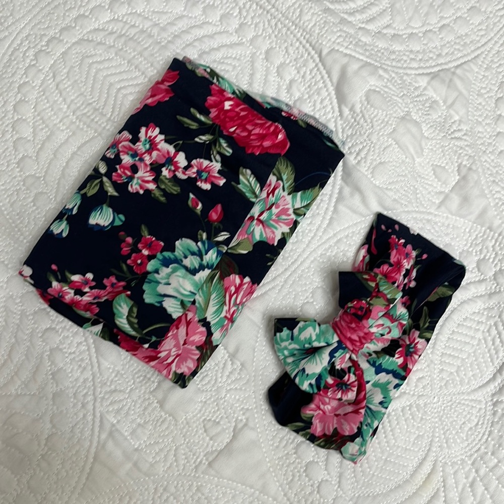 Swaddle and matching headband. Navy/pink floral.